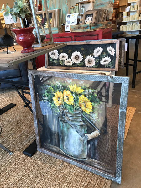 Vintage milk jug with sunflowers