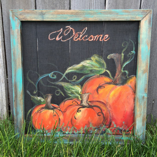 Rustic pumpkin welcome sign with teal frame