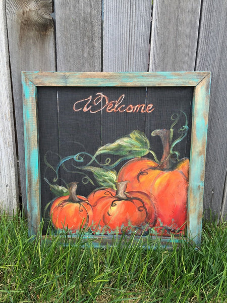 Rustic pumpkin welcome sign with teal frame