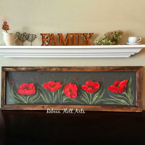 Fields of red poppieswith pallet wood frame