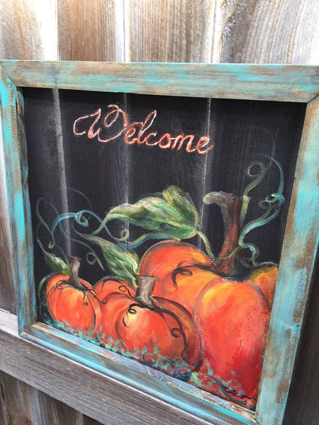Rustic pumpkin welcome sign with teal frame