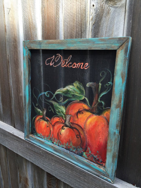 Rustic pumpkin welcome sign with teal frame